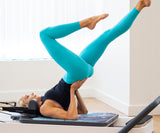 REFORMERMAT Female Practising on Pilates Grip Reformer Mat