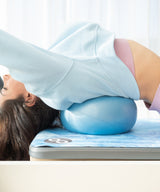 REFORMERMAT Female Practising on Pilates Softball