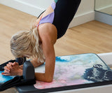 REFORMERMAT Female Practising Reformer Pilates On Durable Micro-fibre Gym Mat