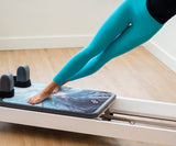 REFORMERMAT Female Practicing Micro-fibre Durable Reformer Pilates Yoga Mat - Fluid Blue Ocean Design